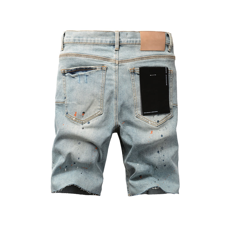 Men Streetwear Denim Shorts Light Blue Wash with Colorful Paint Splashes and Distressed Raw Hem 5071