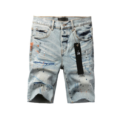 Men Streetwear Denim Shorts Light Blue Wash with Colorful Paint Splashes and Distressed Raw Hem 5071