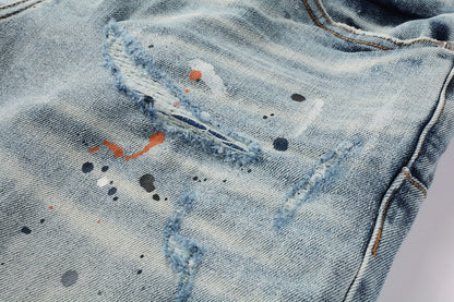 Men Streetwear Denim Shorts Light Blue Wash with Colorful Paint Splashes and Distressed Raw Hem 5071