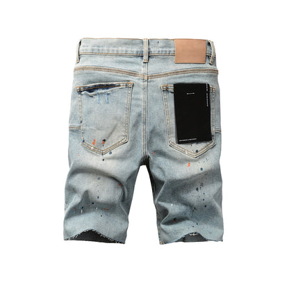 Men Streetwear Denim Shorts Light Blue Wash with Colorful Paint Splashes and Distressed Raw Hem 5071