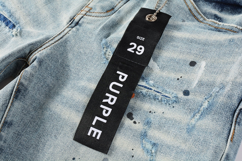 Men Streetwear Denim Shorts Light Blue Wash with Colorful Paint Splashes and Distressed Raw Hem 5071