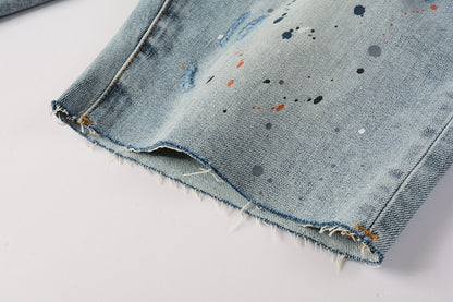Men Streetwear Denim Shorts Light Blue Wash with Colorful Paint Splashes and Distressed Raw Hem 5071